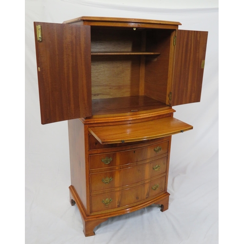 40 - Edwardian yew bachelors cabinet with pull-out shelf, four drawers under with brass drop handles, on ... 