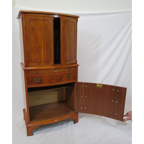 40 - Edwardian yew bachelors cabinet with pull-out shelf, four drawers under with brass drop handles, on ... 