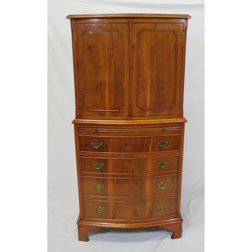 40 - Edwardian yew bachelors cabinet with pull-out shelf, four drawers under with brass drop handles, on ... 