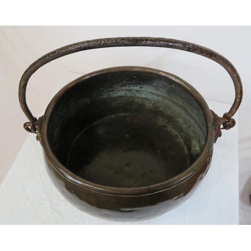 88 - Large Georgian style copper cauldron with shaped handle