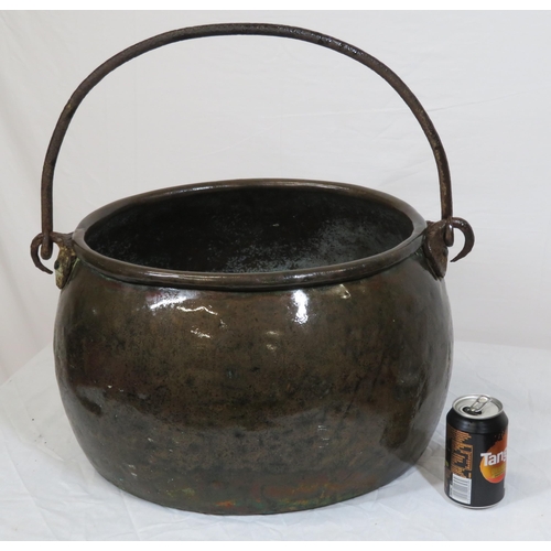 88 - Large Georgian style copper cauldron with shaped handle