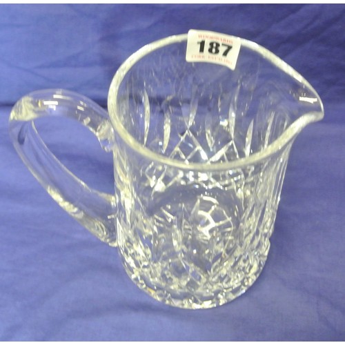 187 - Waterford Crystal cut glass ewer with shaped handle & diamond decoration