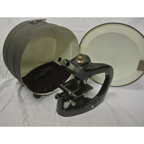 244 - Steindorff adjustable microscope / microbe hunter in circular carrying case.