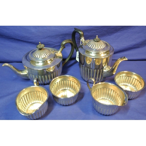 17 - Six piece Sheffield silverplated tea service with reeded decoration and shaped handles