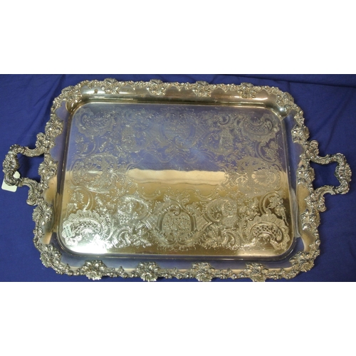 21 - Large silverplated serving tray with ornate grapevine and scroll decoration and a similar half size ... 