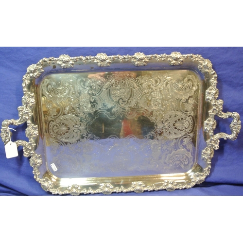 21 - Large silverplated serving tray with ornate grapevine and scroll decoration and a similar half size ... 