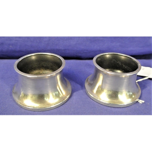 67 - Pair of round Birmingham silver mustard pots of concave tapering form, 112 grams