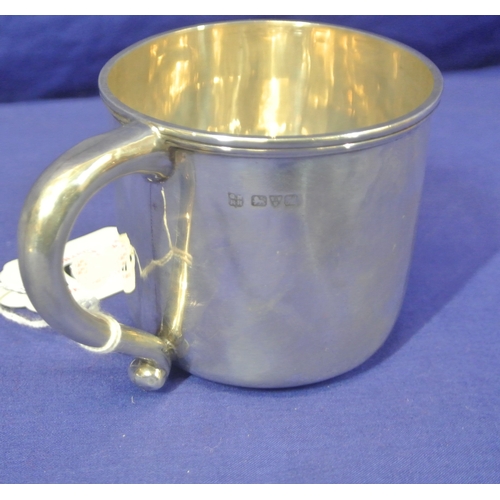 106 - Chester silver round mug with shaped handle, inscribed.100g