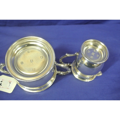 255 - Irish silver creamer and sugar bowl with shaped handles, Celtic design round bases, makers mark 'LG'... 