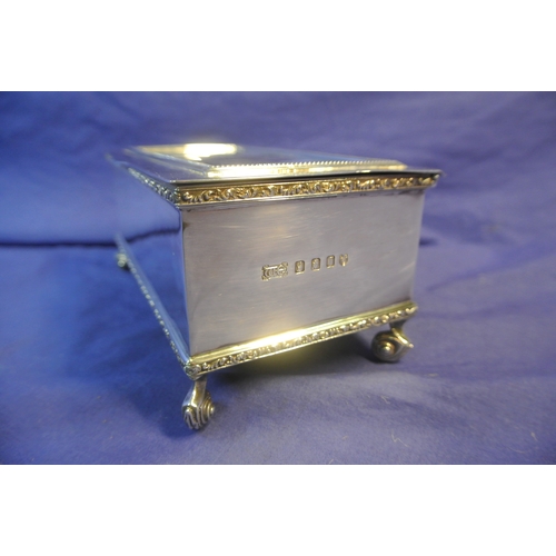 264 - Irish silver jewellery or cigarette box with gadroon decoration, on 4 cast scroll feet and with timb... 