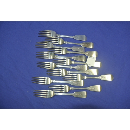 59 - Set of 12 Georgian and Victorian London silver dinner forks with crested fiddle pattern handles, var... 