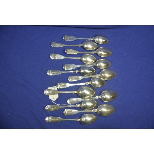 61 - Set of 13 Georgian and Victorian London silver dessert spoons with crested fiddle pattern handles, v... 