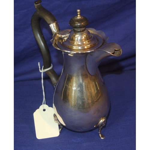 74 - Birmingham silver small coffee or chocolate pot of baluster form, with wavy rim. shaped handle, on 3... 