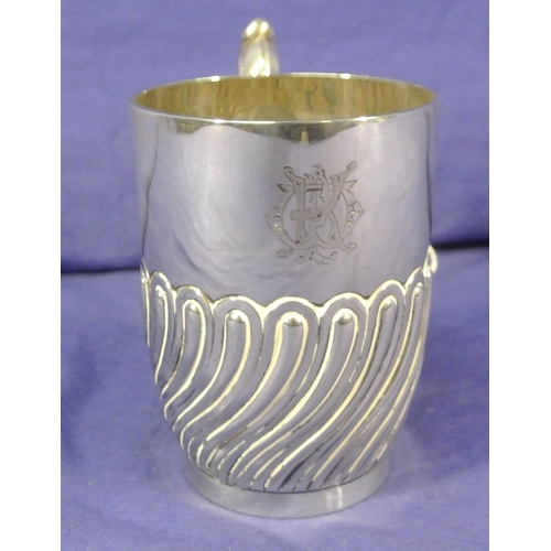 77 - Victorian London silver tankard with scroll handle, fluted lower body, on stepped round base.125g /1... 