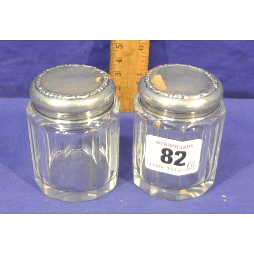 82 - Pair of Chester silver topped dressing table jars. H 6.5cm