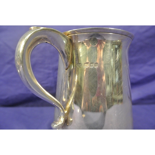 97 - London silver round tankard with shaped handle and stepped base, inscribed 'RAMC golfing society' 19... 