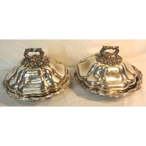 291 - Pair of George IV London silver round entree dishes with foliate, scroll and shell decorated borders... 