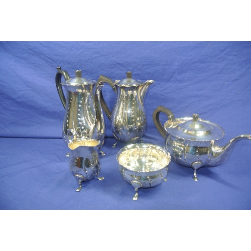 300 - Irish silver 5 piece tea service of baluster form, with wavy rims, beaded decoration, shaped handles... 