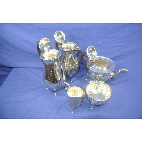 300 - Irish silver 5 piece tea service of baluster form, with wavy rims, beaded decoration, shaped handles... 