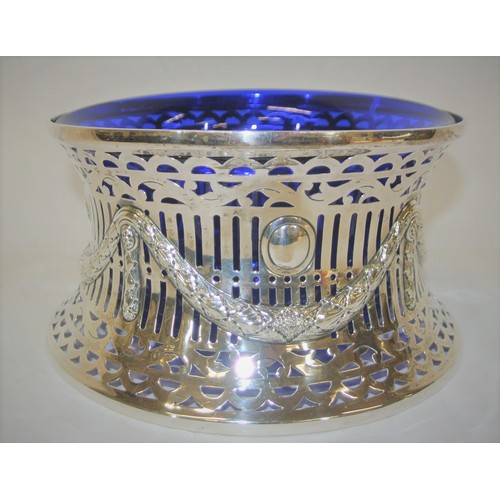 100 - Birmingham silver dish ring with ribbon and reeded decoration, blue glass liner, dated 1912, 307g 20... 