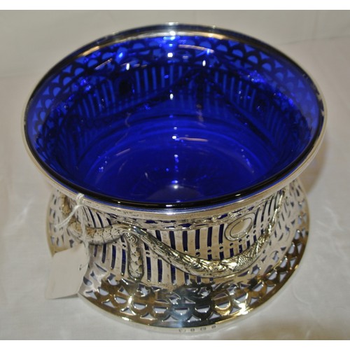 100 - Birmingham silver dish ring with ribbon and reeded decoration, blue glass liner, dated 1912, 307g 20... 