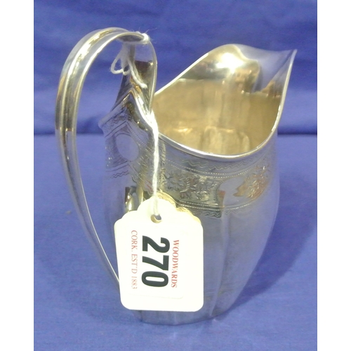 270 - Cork Silver George III cream jug with bright-cut foliate engraving and shaped handle, by John Nichol... 