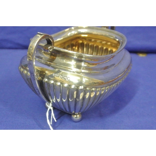 66 - Sheffield silver sugar bowl and creamer with reeded decoration and shaped handles. 310g