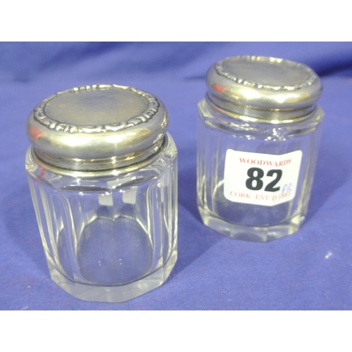 82 - Pair of Chester silver topped dressing table jars. H 6.5cm