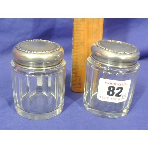 82 - Pair of Chester silver topped dressing table jars. H 6.5cm