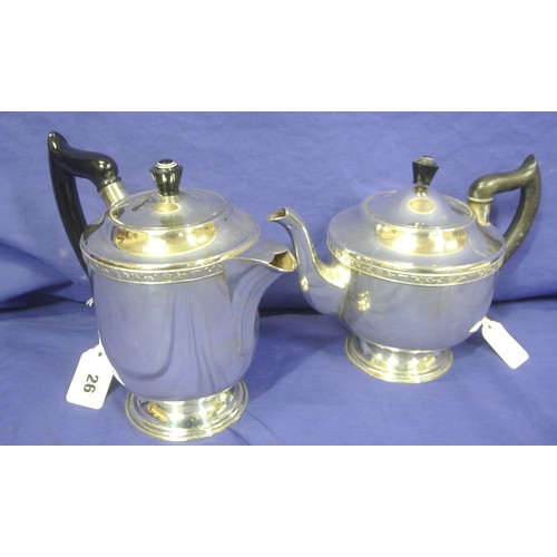 26 - Silver plated teapot and hot water pot with Celtic banding and shaped handles