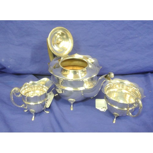 30 - Silver plated 3 piece tea service with wavy rims and stepped feet