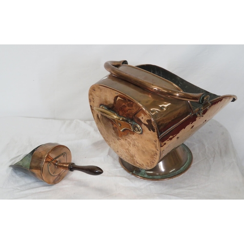 124 - Georgian style copper helmet shaped coal scuttle with shaped handles