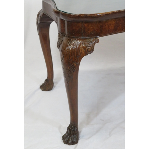 131 - William IV style coffee or occasional table with shaped borders, glass inset, raised on scroll carve... 