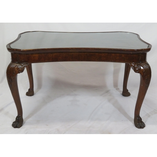 131 - William IV style coffee or occasional table with shaped borders, glass inset, raised on scroll carve... 