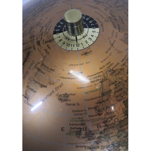 133 - Chrome World globe on shaped stand