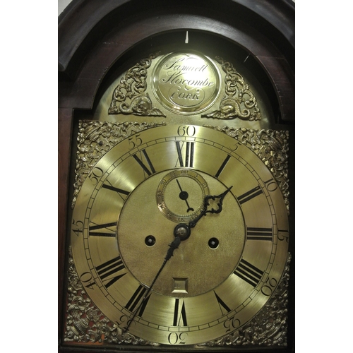 135 - Georgian mahogany longcase clock with domed top, vase finials, domed brass dial with ormolu mounts, ... 