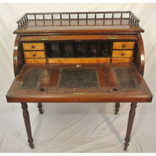 145 - Victorian mahogany desk with railed top, tambour pull-down front, fitted interior, pull-out writing ... 