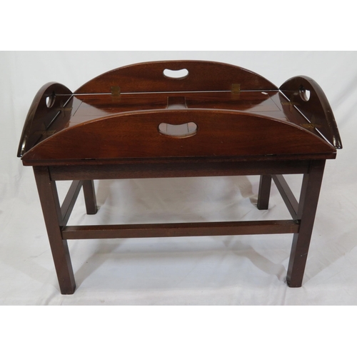 146 - Edwardian mahogany butlers tray with folding demi-lune pierced handles on stand with stretchers