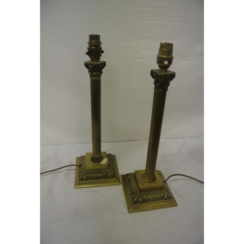 163 - Pair of brass electric lamps with Corinthian columns & foliate decorated stepped bases