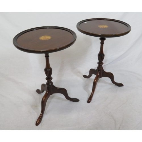 176 - Pair of mahogany round occasional or lamp tables with raised borders, shell inlay, vase turned colum... 