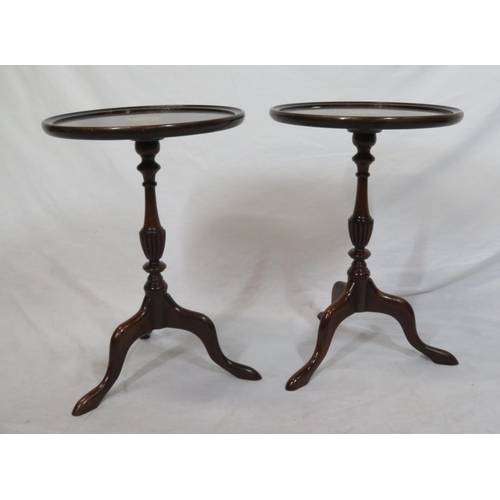 176 - Pair of mahogany round occasional or lamp tables with raised borders, shell inlay, vase turned colum... 