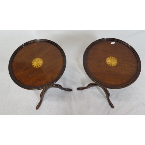 176 - Pair of mahogany round occasional or lamp tables with raised borders, shell inlay, vase turned colum... 