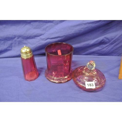 183 - Victorian cranberry glass biscuit or sweet jar with lid, having shaped finial & a matching sugar cas... 