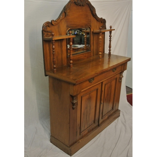 20 - Victorian style walnut chiffonier with shaped back, mirror inset, shelved press under with panelled ... 