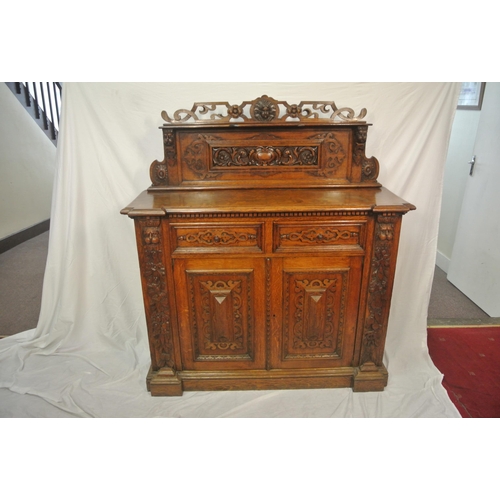 20 - Victorian style walnut chiffonier with shaped back, mirror inset, shelved press under with panelled ... 