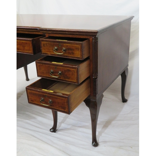 200 - Victorian inlaid mahogany kneehole desk with frieze drawer, six side drawers, brass drop handles, re... 