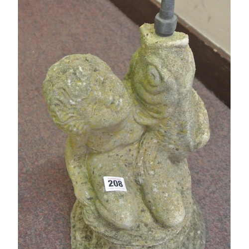 208 - Carved stone fountain of a kneeling boy, on round base