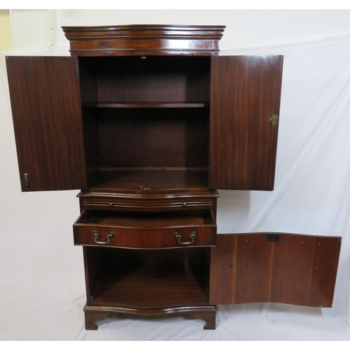 210 - Edwardian mahogany serpentine fronted bachelors cabinet with shelved interior, pull-out shelf, four ... 