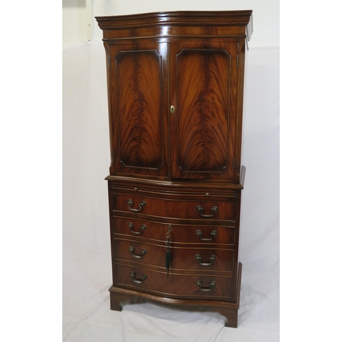 210 - Edwardian mahogany serpentine fronted bachelors cabinet with shelved interior, pull-out shelf, four ... 