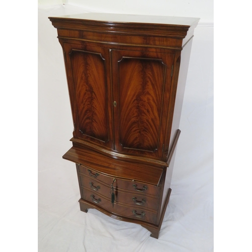 210 - Edwardian mahogany serpentine fronted bachelors cabinet with shelved interior, pull-out shelf, four ... 